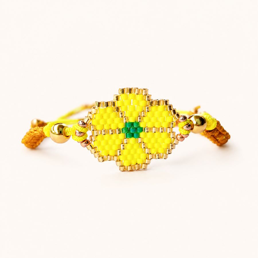 Pulsera flor amarilla, ajustable, de cuentas Miyuki hecha a mano por Joyas Coquetas en Málaga