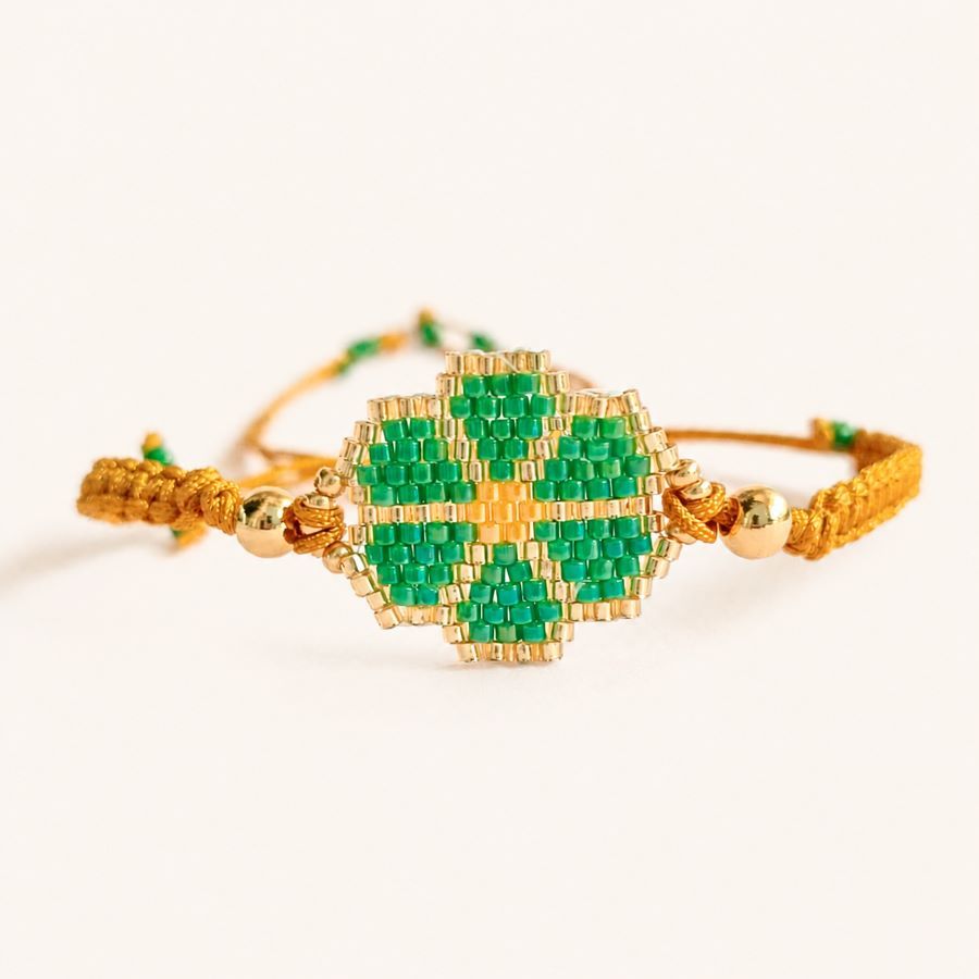 Pulsera flor verde con cuentas Miyuki y cordón ajustable, hecha a mano por Joyas Coquetas en Málaga