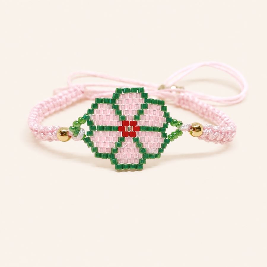 Pulsera Flor Rosa; artesanal; con técnica de tejido Miyuki, hecha a mano por Joyas Coquetas en Málaga.