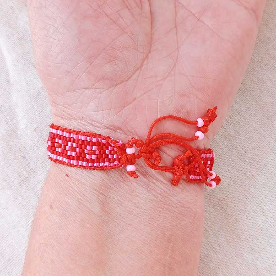 Pulsera Miyuki Flores • Joyas Coquetas Parte trasera de pulsera artesanal Miyuki con nudo ajustable