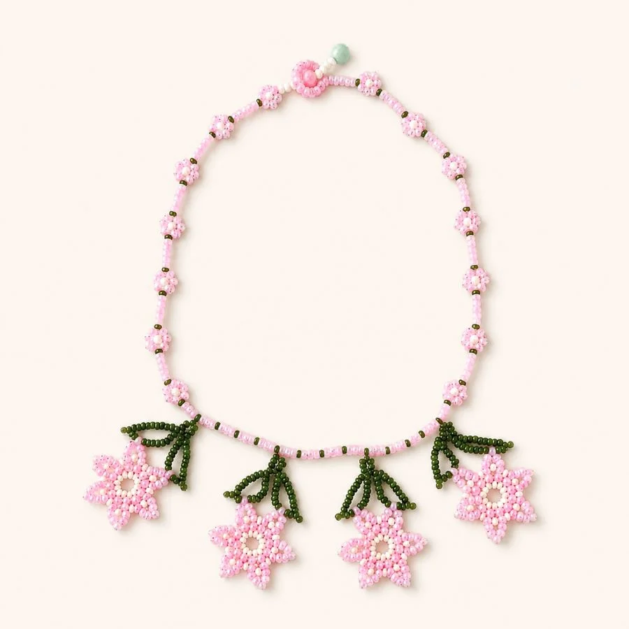 Gargantilla flores rosas, artesanal hecho a mano por Joyas Coquetas en Málaga con cuentas Miyuki y cristal checo